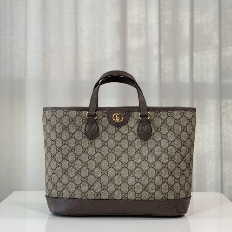 G*u*i shopping bags